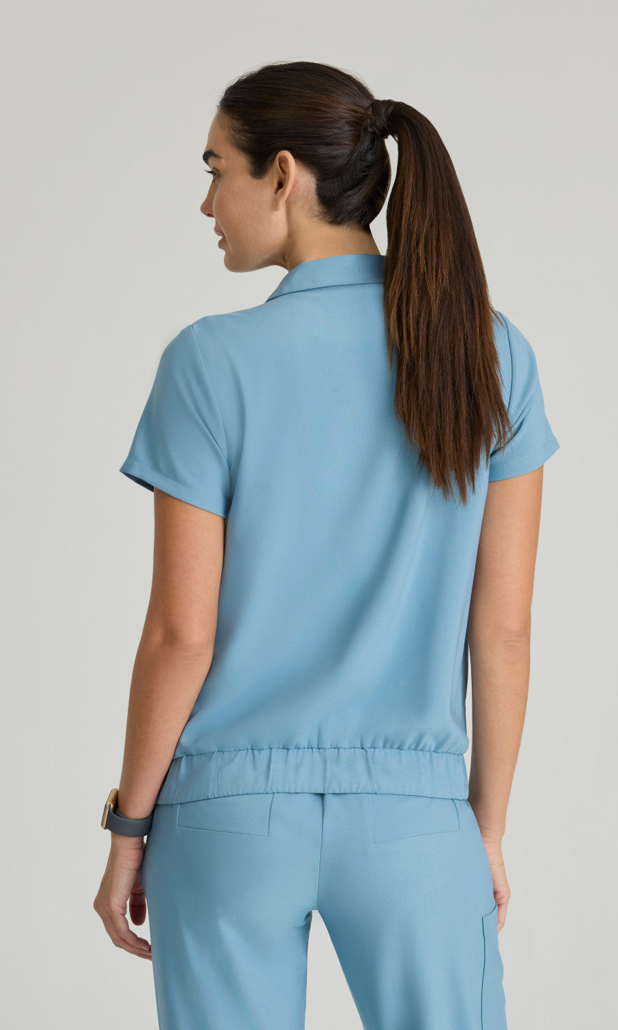 Grey's Anatomy Evolve GSST215 Perseverance Scrub Top Ocean Mist