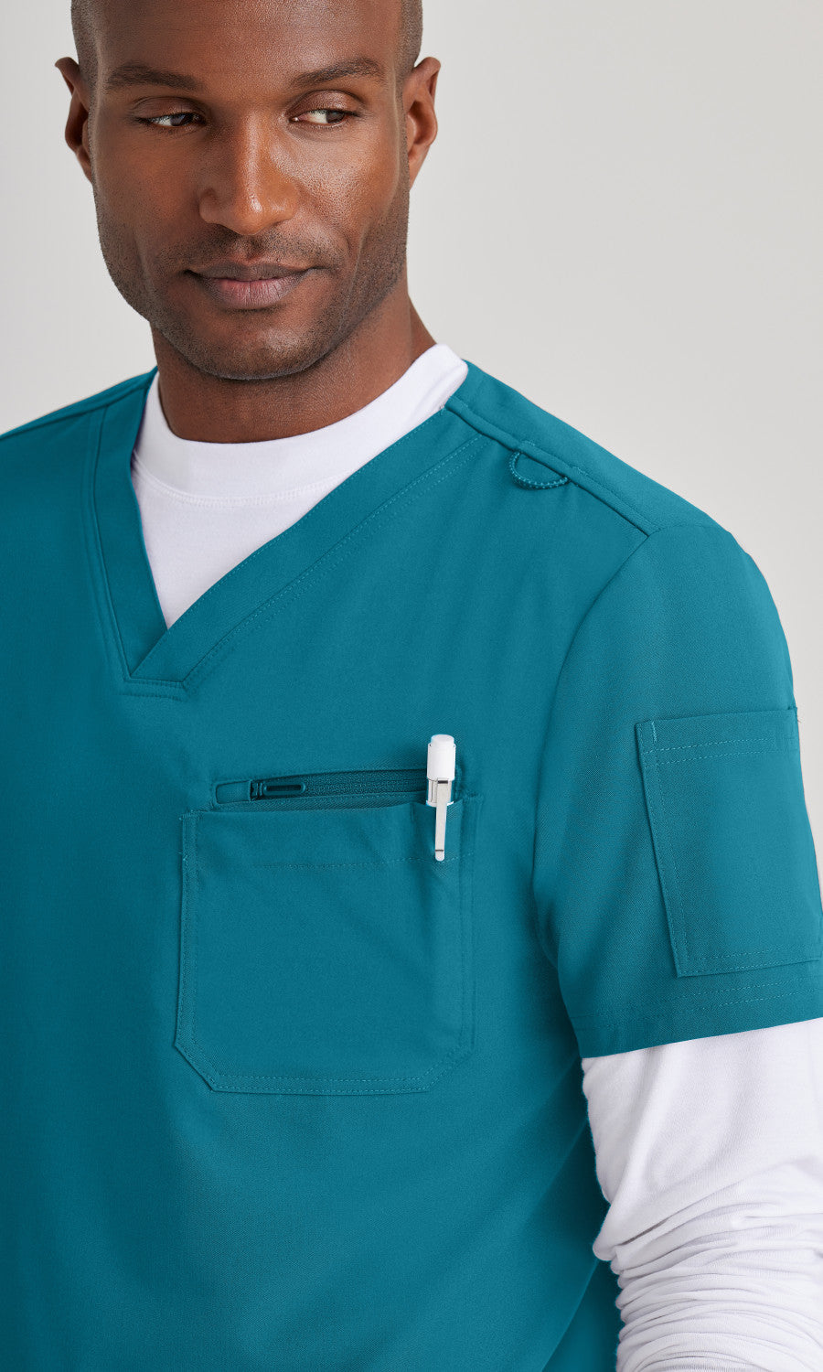 Barco Unify BUT153 Rally Scrub Top Bahama