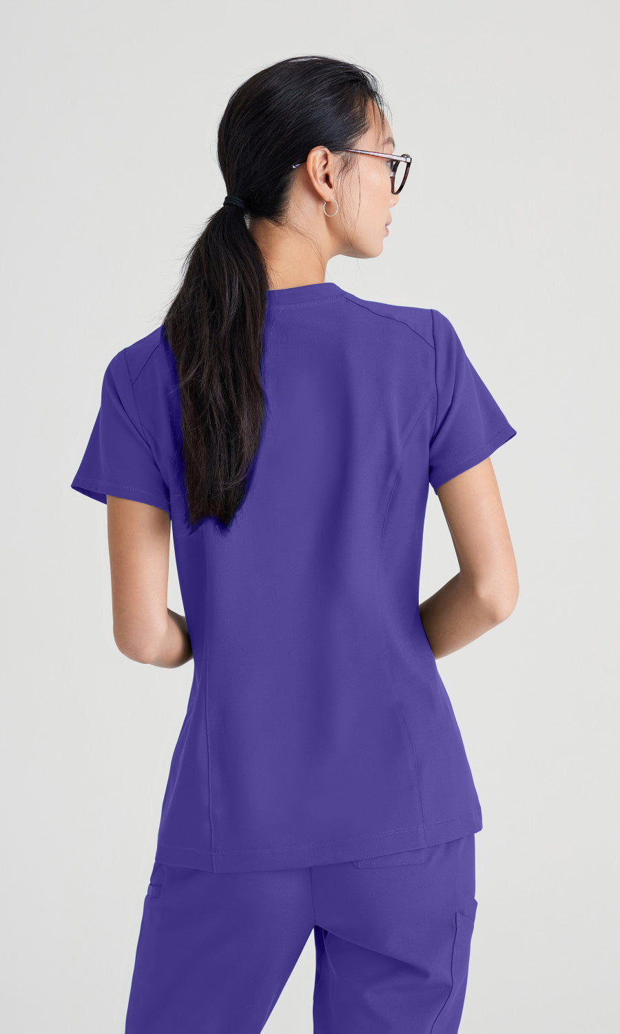 Grey's Anatomy Evolve GSST181 Sway Tuck-In Scrub Top New Grape